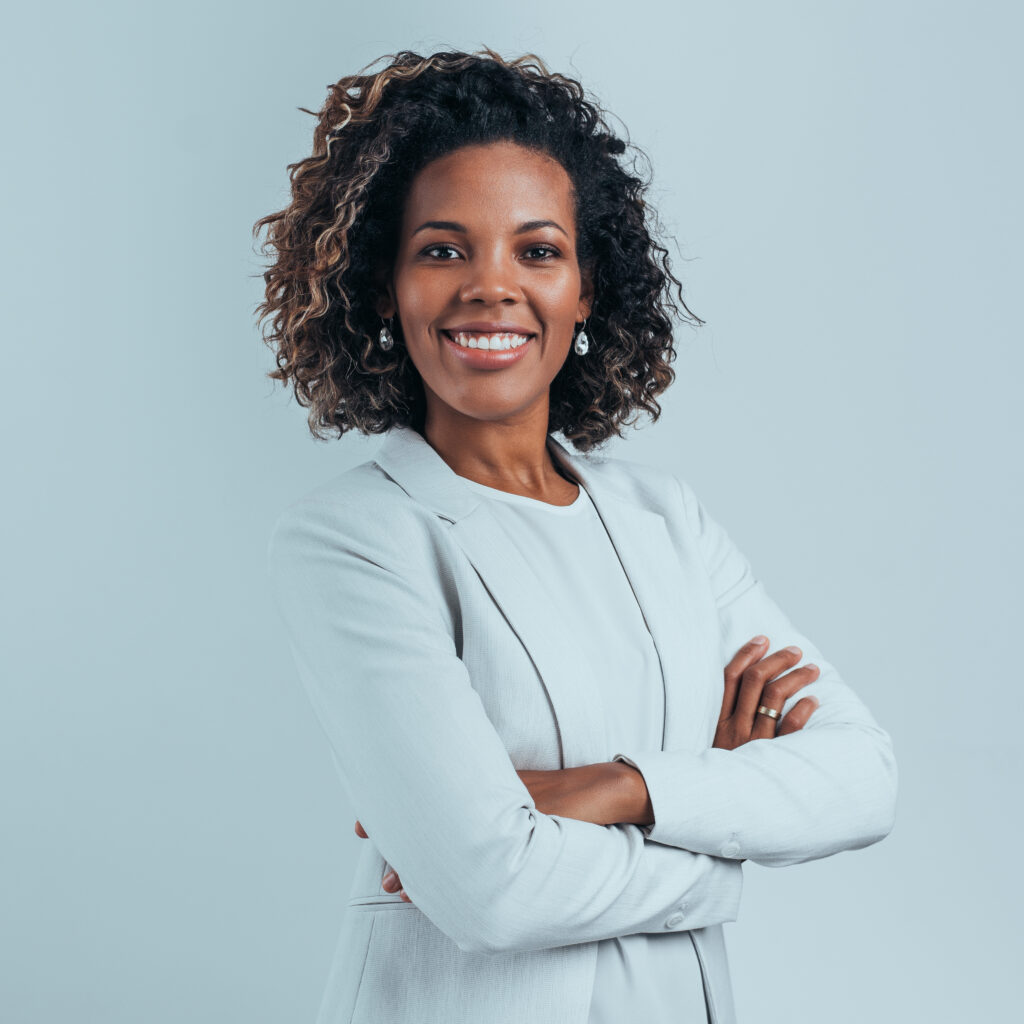 Portrait of a successful entrepreneur, smiling at camera.